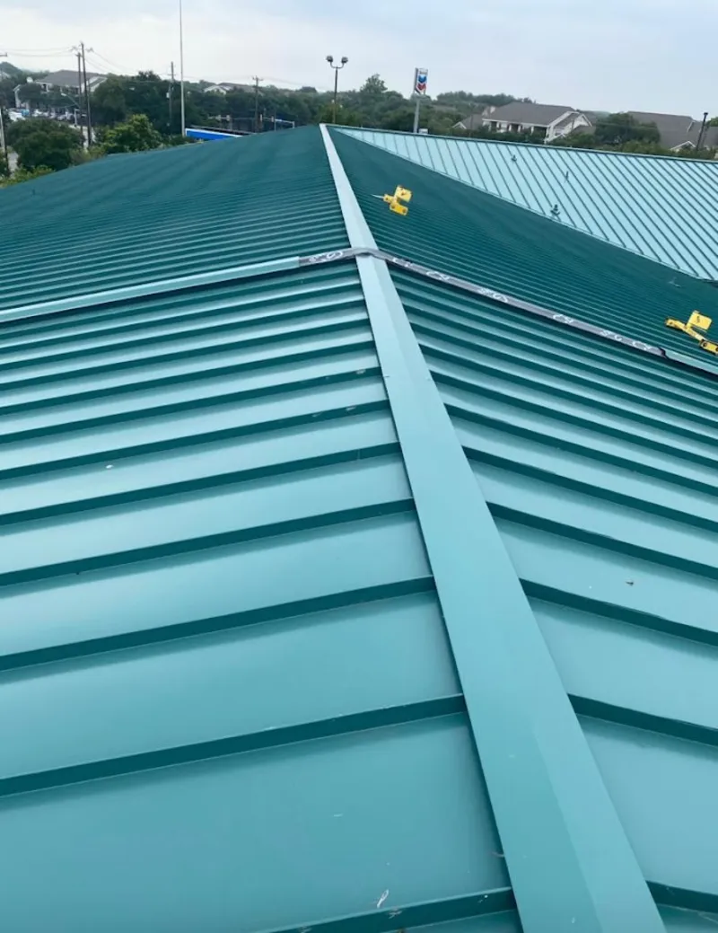 Green commercial metal roof ridge and valley for Metal Roof Repair in Clovis