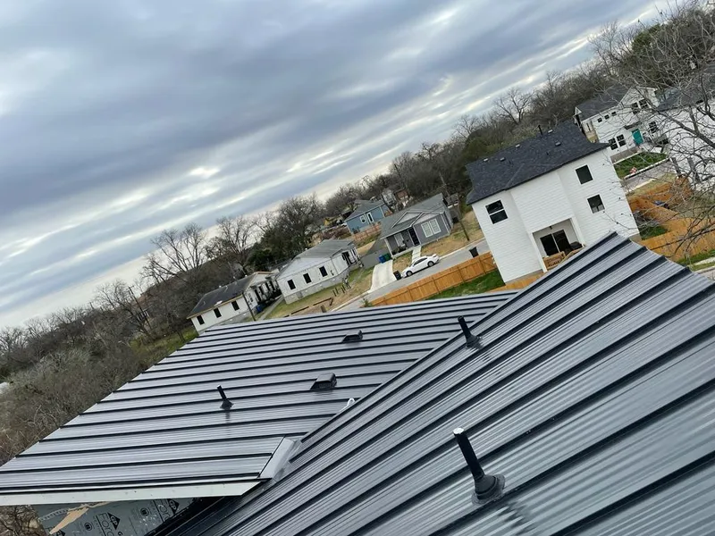 Standing seam metal roof panels with vents for Skylight Repair in Clovis